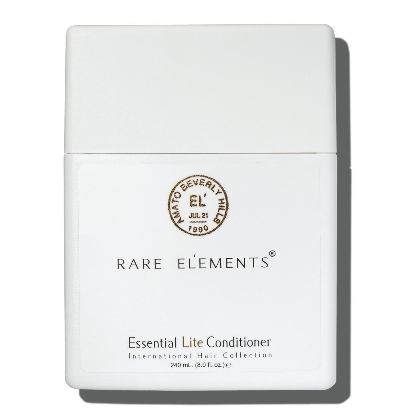 White conditioner bottle with 'Rare Elements' Essential lite conditioner on a white background