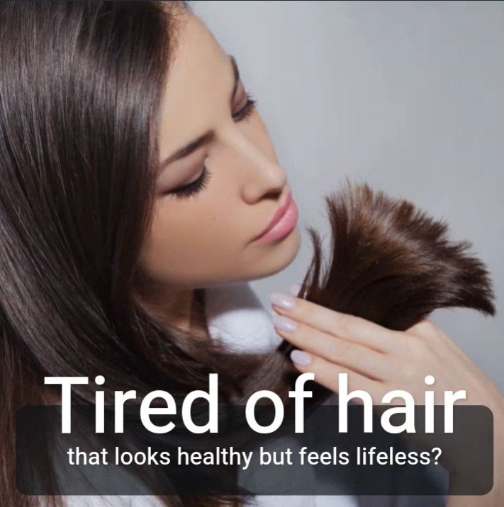 Girl looking at her hair ends and text that say, tired of hair that looks healthy but feels lifeless?