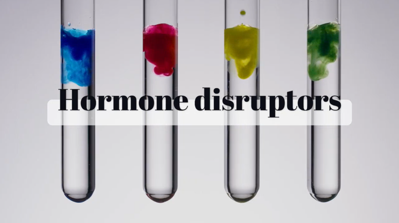 Test tube bottles that says hormone disruptors.