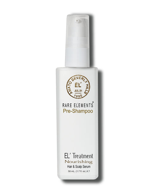 A luxury hair and scalp treatment in a white bottle with a treatment pump dispenser labeled 'RARE ELEMENTS Pre-Shampoo Hair & Scalp Serum', with gold  text.