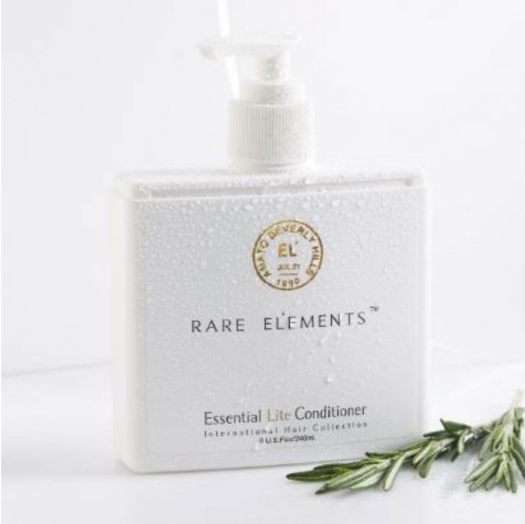 Rare Elements Essential Lite Conditioner bottle and packaging on a white background and a rosemary sprig.