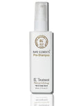 White bottle of EL' Treatment Nourishing Hair & Scalp Serum on a white background